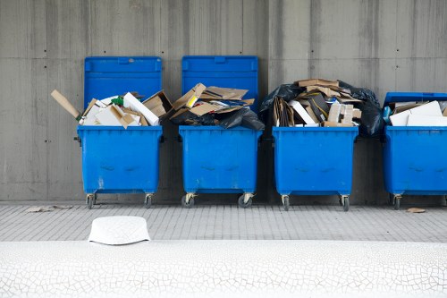 Residents disposing of household waste in Barbican