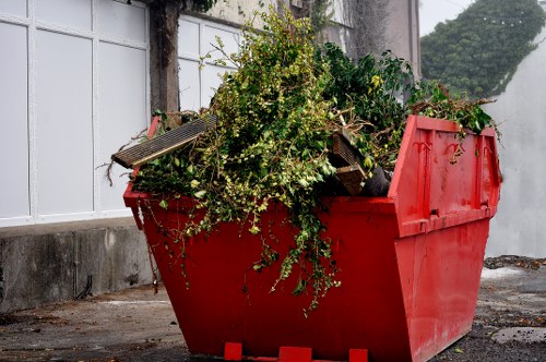 Bulk waste collection truck removing furniture in Barbican